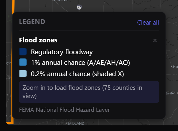 The legend note asking you to zoom in for flood zones